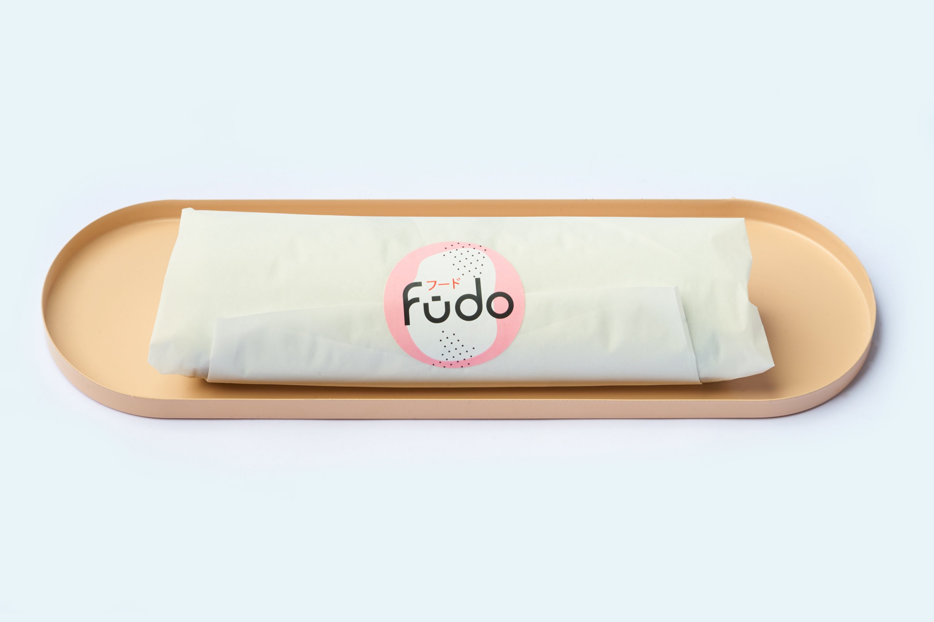 Fūdo Sushi brand detail — close-up of the identity in use